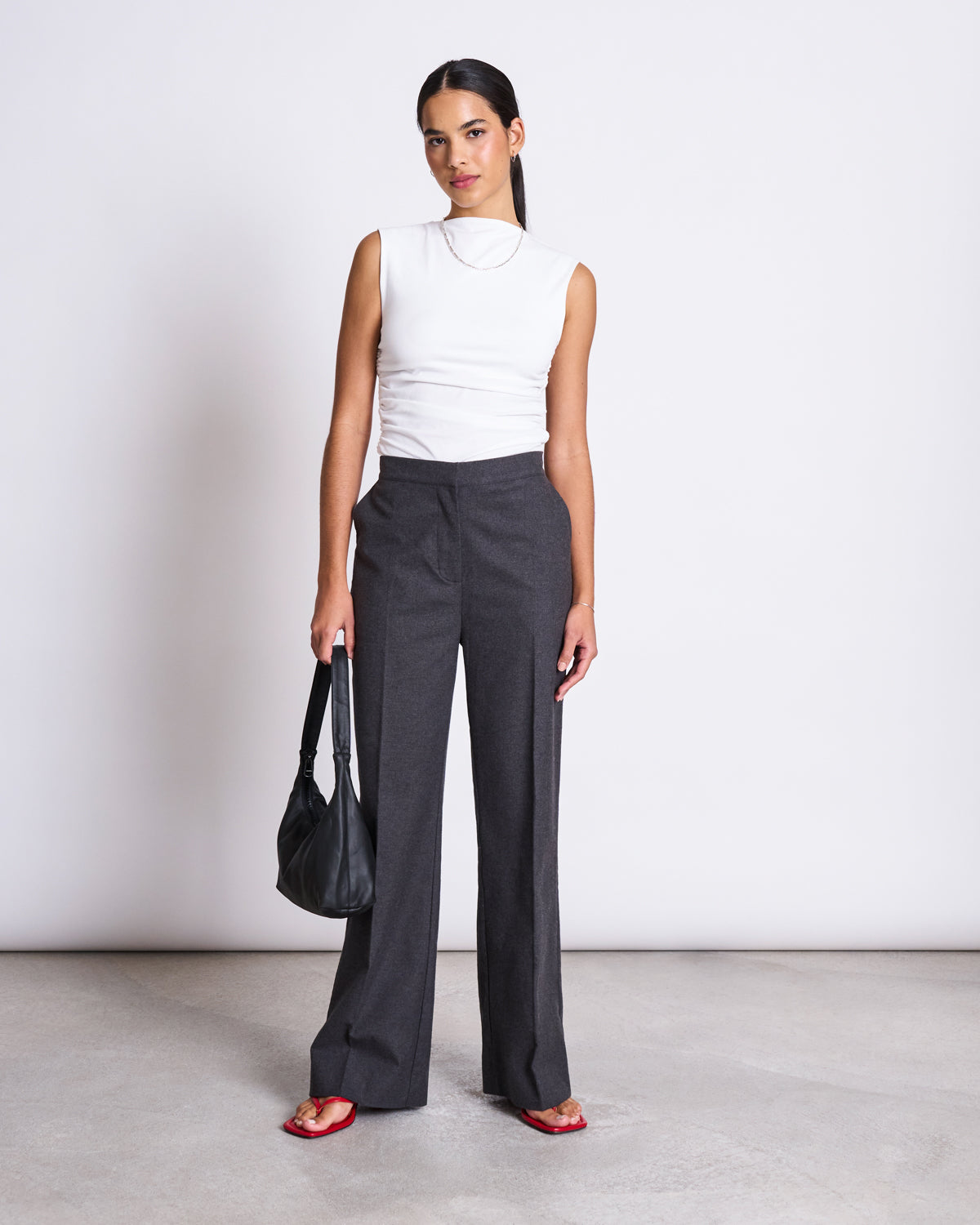 Black top with grey pants store