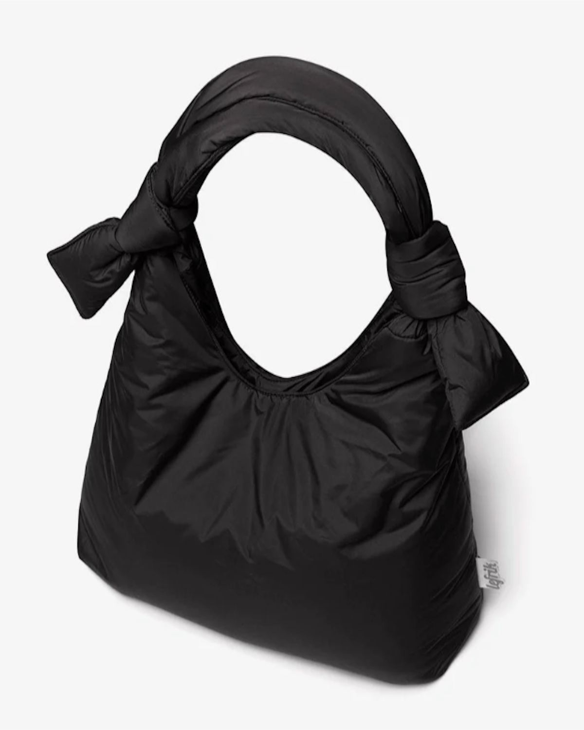 The BAG BIWA PUFFY REGULAR BLACK by jan-n-june is a black, puffy handbag crafted from water-repellent recycled plastic fabric, featuring a soft padded texture and rounded handle with adjustable sliding knots, shown on a plain white background.