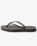 The jan-n-june SLEEPERS TAPERED FLIP FLOPS BROWN features a dark brown design with thin straps and a textured footbed—ideal for sustainable fashion lovers seeking biodegradable footwear.
