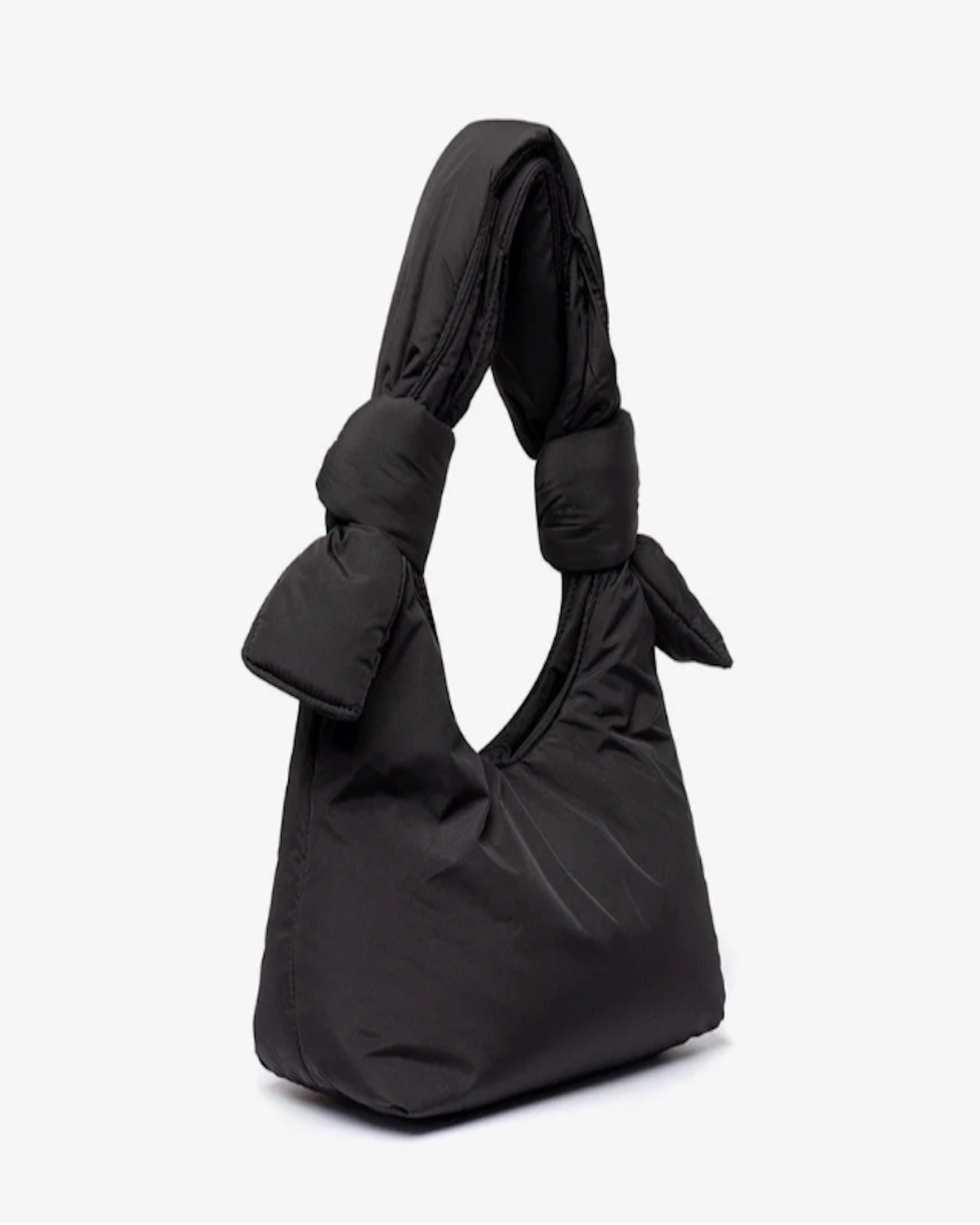 The BAG BIWA PUFFY MINI BLACK by jan-n-june is a black, structured mini handbag with two large knotted handles, made from water-repellent recycled fabric and shown against a plain white background.