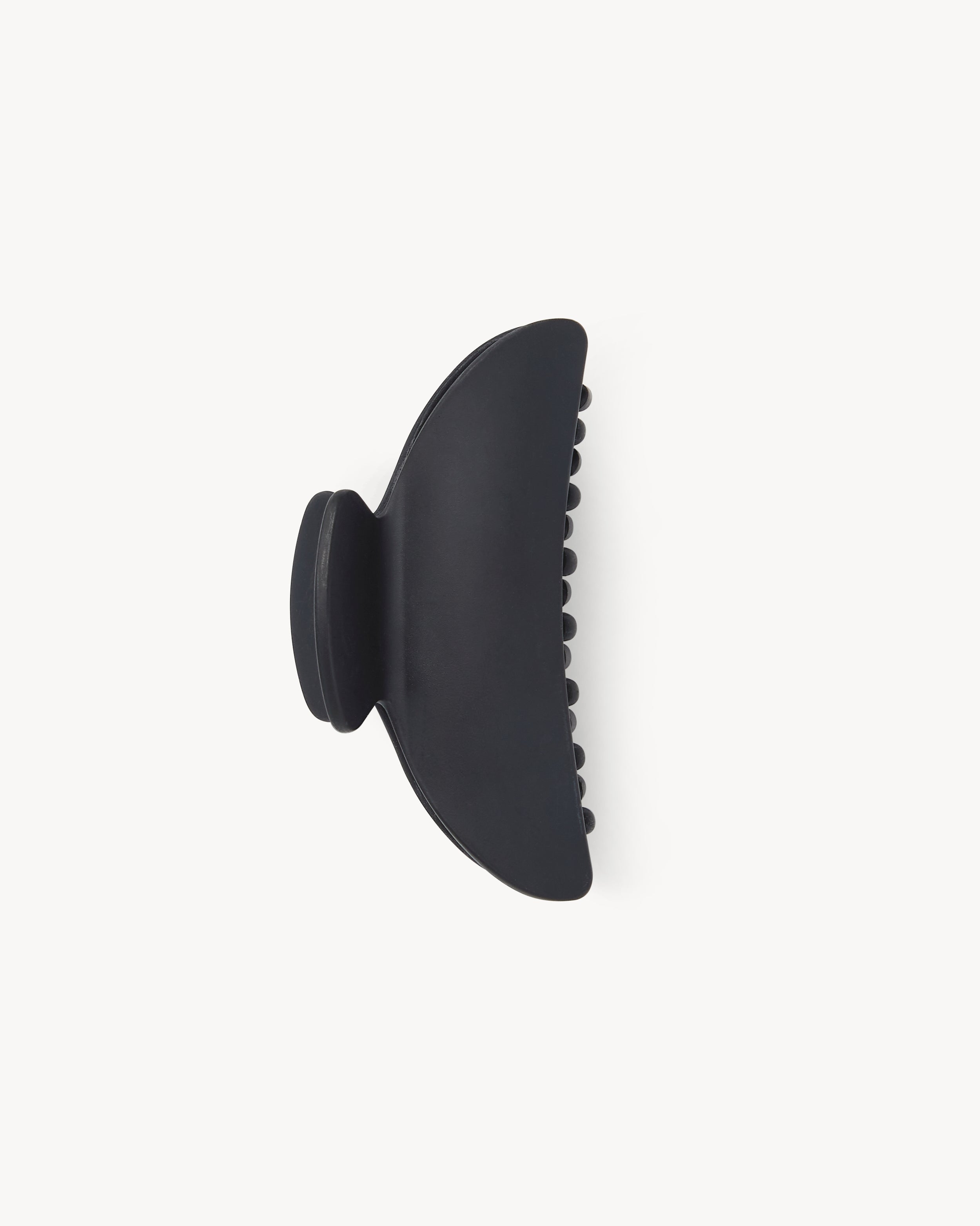 The jan-n-june MIDI HEIRLOOM CLAW BLACK MATTE is a curved, matte black hair clip with interlocking teeth, displayed on a plain white background.