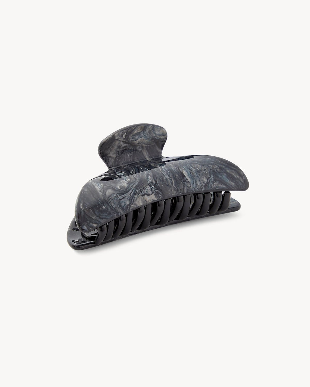 The jan-n-june MIDI HEIRLOOM CLAW OBSIDIAN is a gray marbled, sustainable plastic hair claw with interlocking teeth and a curved silhouette, shown on a plain white background.