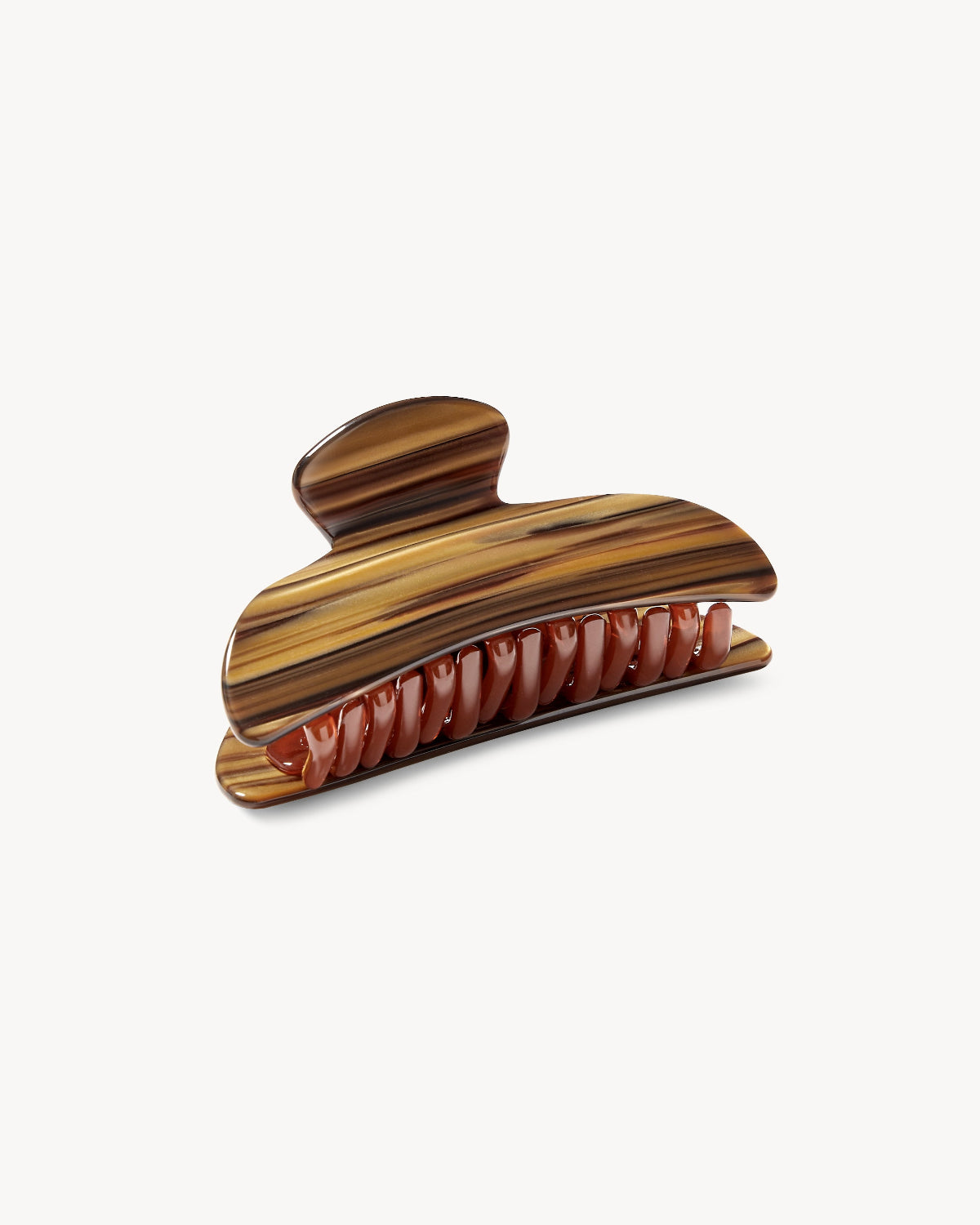 The jan-n-june MIDI HEIRLOOM CLAW TIGER'S EYE is a brown marbled acetate hair clip featuring a curved top and interlocking teeth, shown on a plain white background.