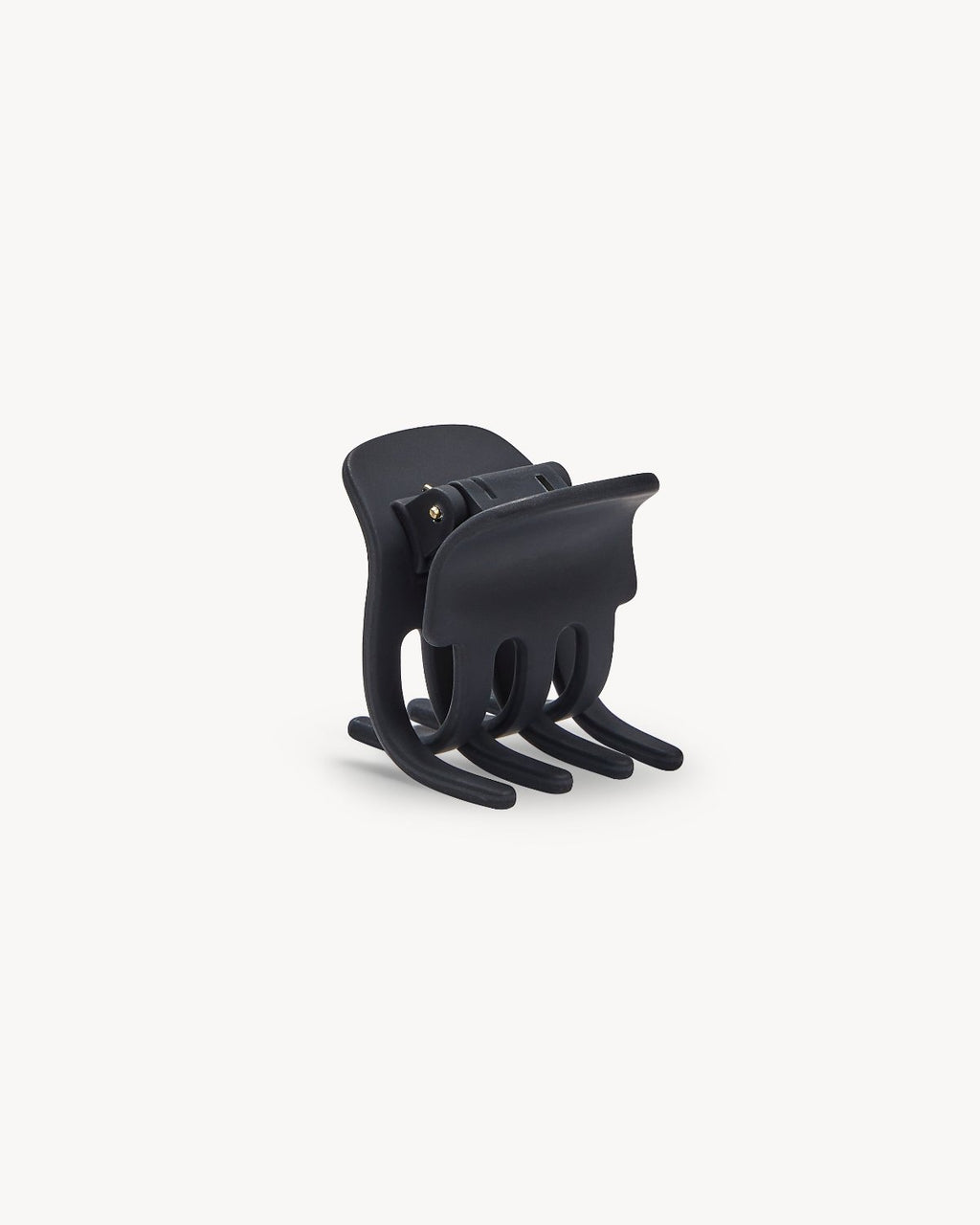 The jan-n-june MINI CLAW BLACK MATTE is a black plastic hair claw with interlocking curved prongs, displayed upright on a plain white background.