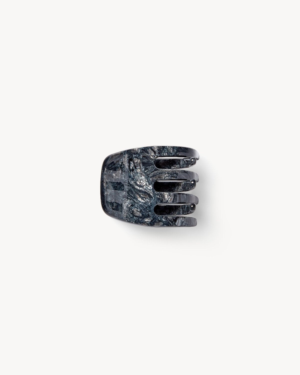 The jan-n-june MINI CLAW OBSIDIAN is a handcrafted, dark marbled hair claw made in Italy with a textured finish, displayed against a plain white background.