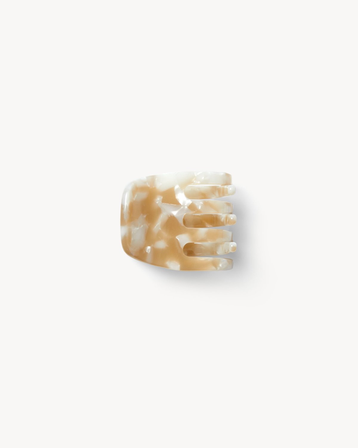 The MINI CLAW TAUPE SHELL by jan-n-june is a small, beige and white marbled hair clip with wide prongs, handcrafted in Italy, shown on a plain white background.