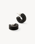 A pair of chunky, black matte MUSE HOOPS by jan-n-june with silver posts, displayed on a white background—sustainable earrings perfect for your everyday jewelry collection.