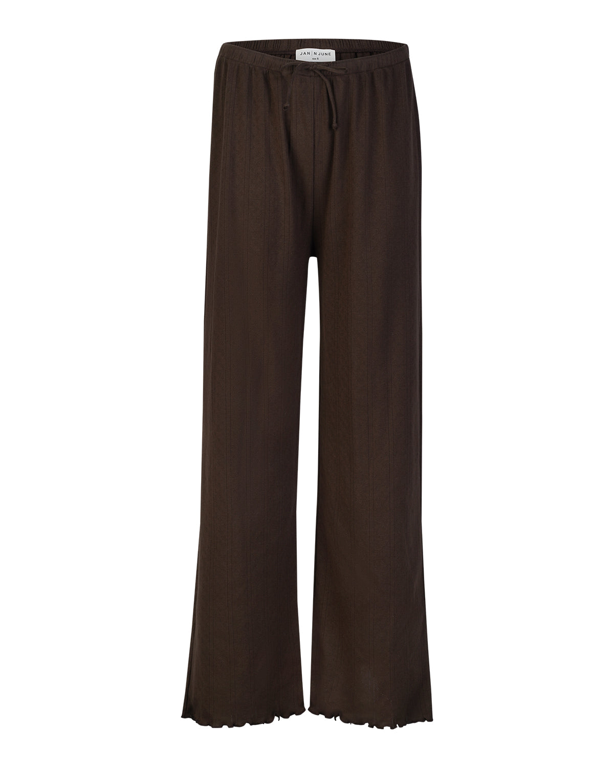 The jan-n-june POINTELLE PYJAMA PANTS CHOCOLATE GOTS are loose-fitting, organic cotton pyjama pants in dark brown with a drawstring waist and slightly flared legs, shown against a white background.