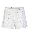 The POINTELLE PYJAMA SHORTS BLOOMY GOTS by jan-n-june are white cotton shorts featuring a pink floral print and thin stripes, made from GOTS certified organic cotton with an elastic waistband and central button fly for comfort.