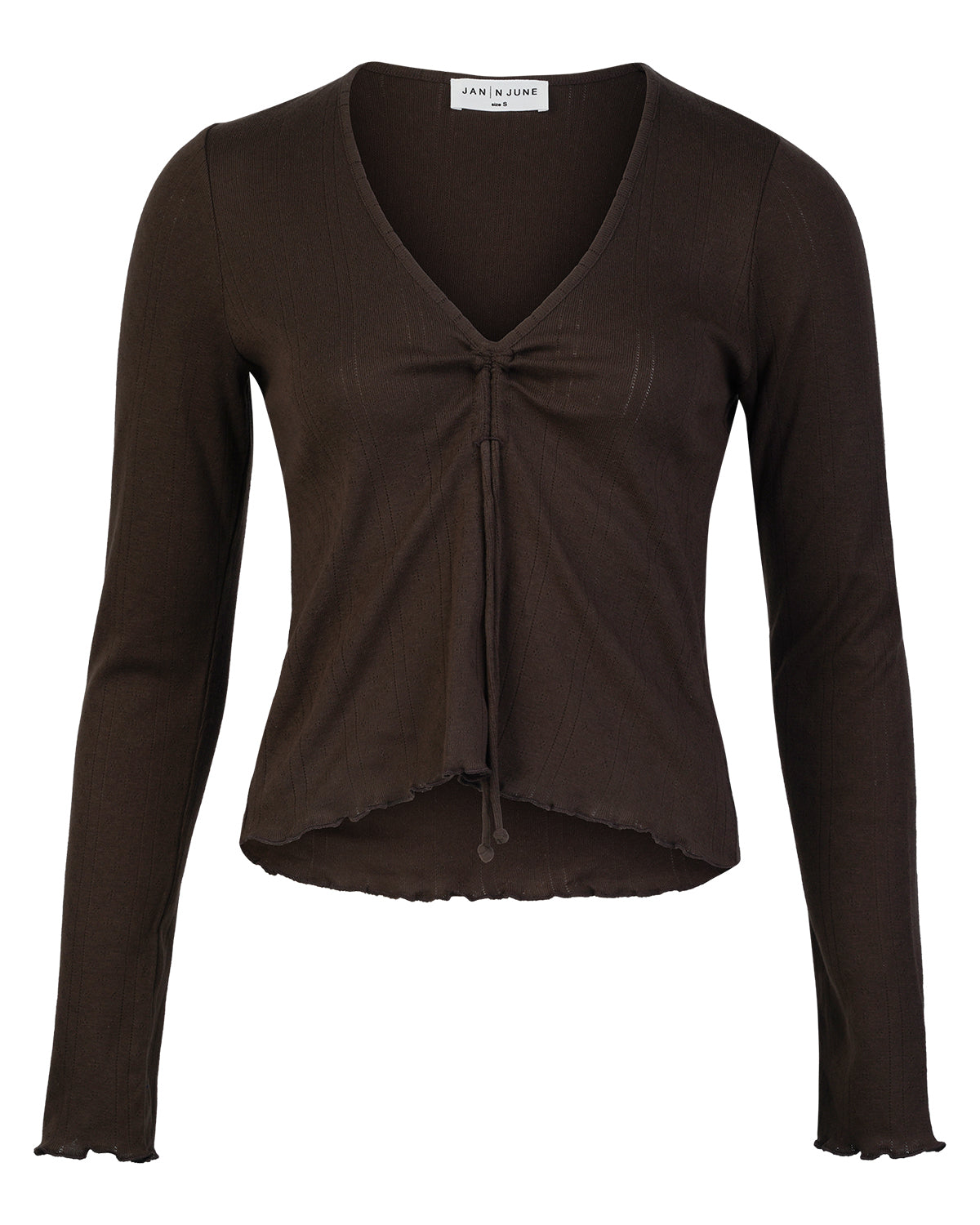The POINTELLE PYJAMA V-NECK LONGSLEEVE CHOCOLATE GOTS by jan-n-june is a brown, ribbed knit top with long sleeves, a V-neckline, adjustable front tie, and ruffled hem and cuffs. Made from GOTS certified fabric.