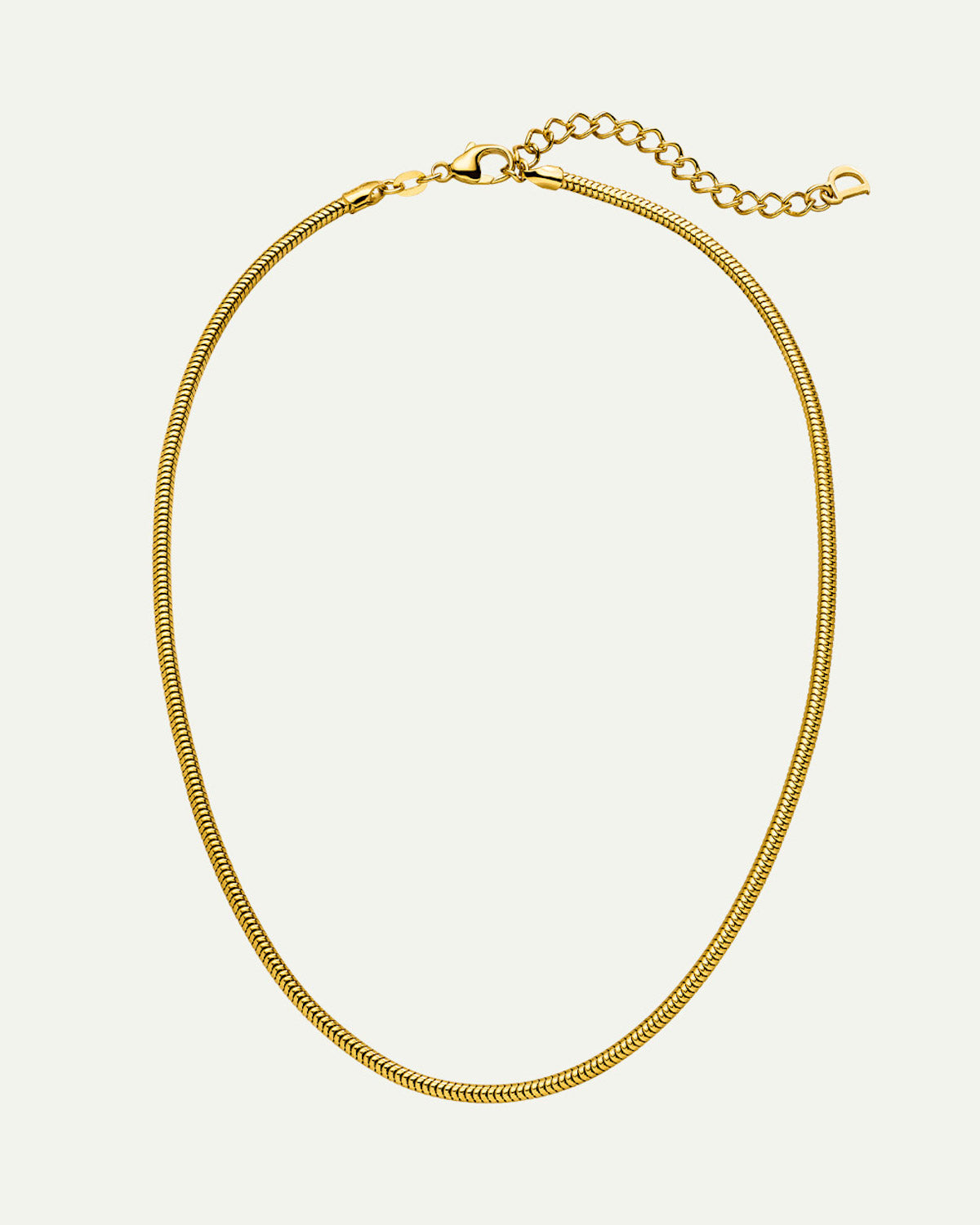 The jan-n-june DEAR DARLING BERLIN DELICATE SHORT SNAKE NECKLACE GOLD is a thin, gold snake chain necklace made from recycled 925 sterling silver with a lobster clasp and adjustable extension, shown on a plain light background.