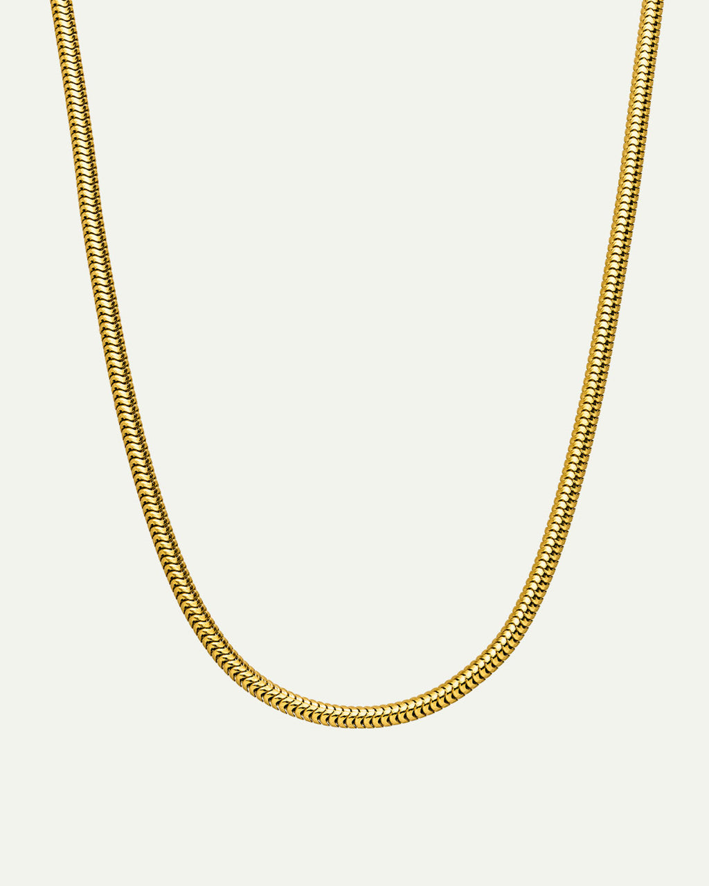 The DEAR DARLING BERLIN DELICATE SHORT SNAKE NECKLACE GOLD by jan-n-june features a smooth, flat design and is crafted from recycled 925 sterling silver, shown against a plain white background.