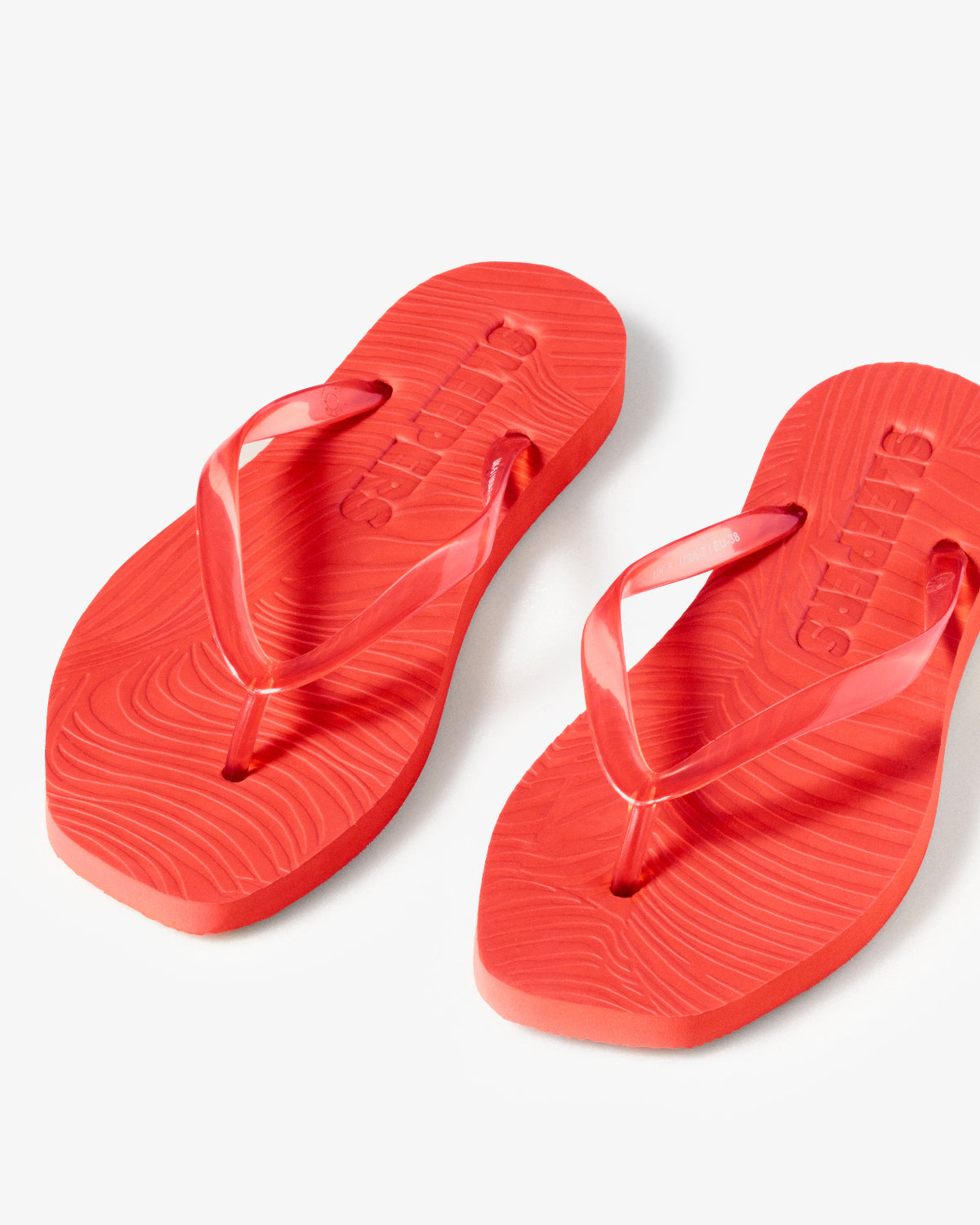 SLEEPERS TAPERED FLIP FLOPS TRANSPARENT RED