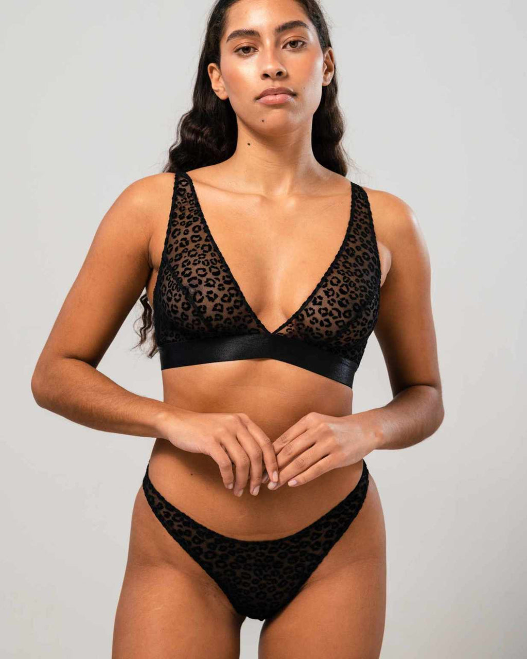 UNDERSTATEMENT MESH PLUNGE BRALETTE BLACK LEOPARD