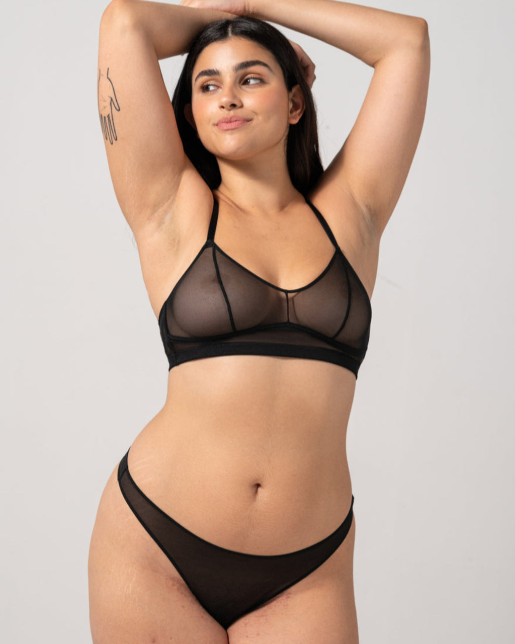 UNDERSTATEMENT MESH THONG BLACK